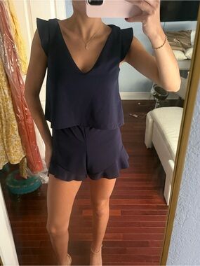 Aqua Navy Sleeveless V-Neck Romper with Ruffle Hem